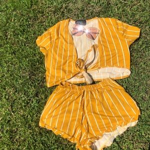 Women White and yellow striped ruffled shorts